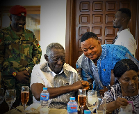 Former President Kufuor exchanging pleasantries with Nene Lartey Osakonor I