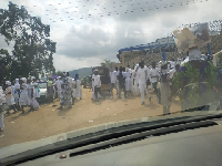 Members of the Second Chance Church blocking the road