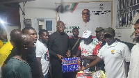 Team Jnr JM presenting the campaign materials to Abdul Latif Dan