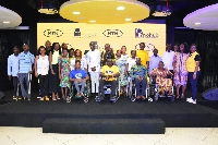 A group picture of Adwoa Wiafe, some differently abled beneficiaries, staff of MTN Ghana and Innohub
