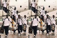 Players of the Black Stars getting off the plane