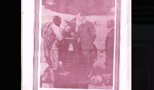 EK Duncan-Williams in a handshake with the late Prince Charles and Queen Elizabeth