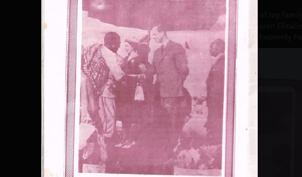 EK Duncan-Williams in a handshake with the late Prince Charles and Queen Elizabeth