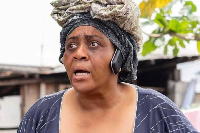A scene featuring Blessing Onwukwe as 'Mama Monica' in the movie 'Monica 2'