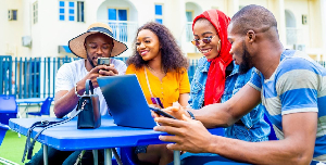 Students seen holding their phones