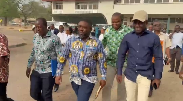 Kwabena Mintah Akandoh (R) with health workers in the Northern Region