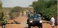 Malian soldiers patrol the entrance of Gao, northern Mali, 8 February 2013