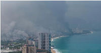 Plumes of smoke rose along the waterfront in Puerto Vallarta