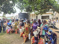 William Atamudzi with some of the widows