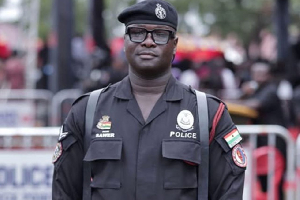 Sawer John Amonor is a police officer and a photographer Sawer John Amonor is a police officer and a photographer