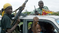 Liberian rebels celebrate in Monrovia in August 2003. PHOTO | FILE | NMG