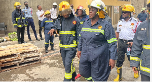 Chief Fire Officer Daniella Mawusi Ntow-Sapong with other fire personnel at Tema Flour Mills