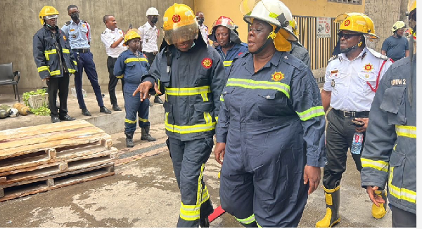 Chief Fire Officer Daniella Mawusi Ntow-Sapong with other fire personnel at Tema Flour Mills