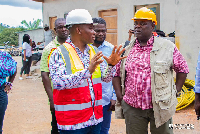 Deputy lands minister, George Mireku Duker and Koku Anyidoho, CEO of AMI