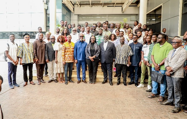 A group photograph of some participants with the Minister for Communications and Digitalisation