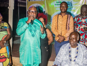 Prof Ladé Wosornu (seated R) with Gideon Aryeequaye of the Creative Arts Agency (L)