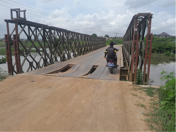 Motorist crossing deadly bridge with holes