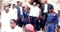 President Akufo-Addo responding to cheers from the crowd after the service