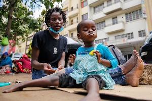 AE-Rebecca with her child_credit Brain Inganga_BBC