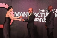 Deputy MD-Marketing for Tobinco Pharmaceuticals, Dr. Christopher Mensah, receiving the awards