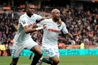 Andre Ayew (R) celebrating his goal with his teammate