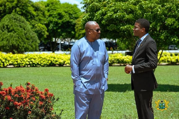 President Mahama (L) and Grenadian PM Dickon Mitchell having a conversation in the garden