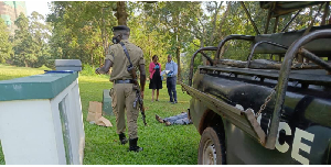 Police and forensic expats remove a body from the Gulf course grounds on June 11, 2024.