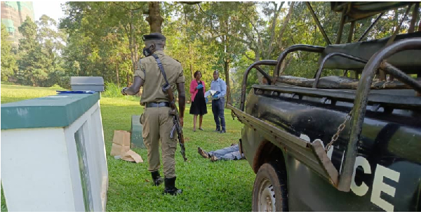 Police and forensic expats remove a body from the Gulf course grounds on June 11, 2024.