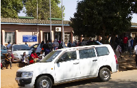 Malawians line up at immigration offices in Lilongwe, as demand for passports surges