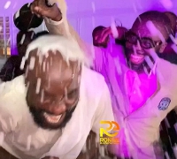 Highlife musician, Kwabena Kwabena being sprayed with champagne at his birthday party