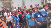 A photo of Kumasi traders demonstrating
