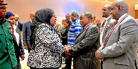 President Samia Suluhu Hassan greets Bishop Dr Benson Bagonza in Arusha yesterday
