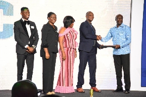 David Narh, Digital Channels Growth Manager at MTN Ghana receiving the CIMG Hall of Fame award