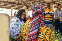Dr Naa Momo Lartey (L) speaking with the woman who is receiving treatment