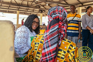 Dr Naa Momo Lartey (L) speaking with the woman who is receiving treatment