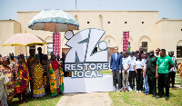 Members of Restore Local in a photo wiht key stakeholders during the launch