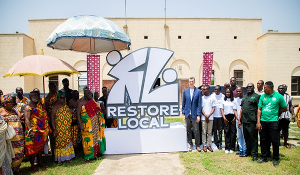 Members of Restore Local in a photo wiht key stakeholders during the launch