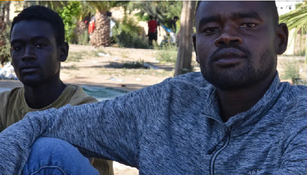 Hassan Mahjoub and Abkar Yaguop at a refugee camp in Sfax, Tunisia