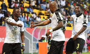 Black Stars jubilating after scoring against Uganda