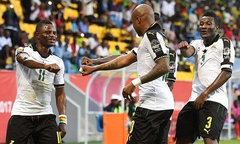 Black Stars jubilating after scoring against Uganda
