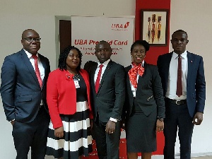 Richard Ahiagble, Theresa Adade with Johnson Olakunmi and his team from UBA