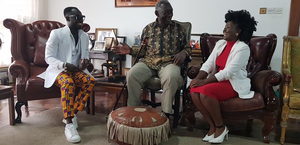 Okyeame Kwame with his wife and former president John Agyekum Kuffour