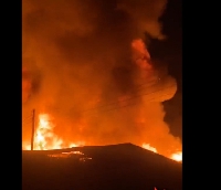 The fire has reportedly destroyed several wooden structures
