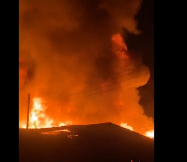 The fire has reportedly destroyed several wooden structures