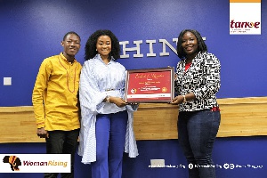 Ms. Angela Kyerematen-Jimoh, General Manager of IBM Ghana [centre] receiving the award