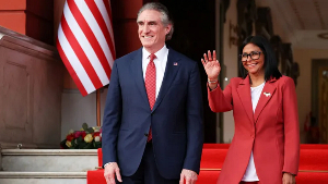 Venezuela's interim president, Delcy Rodriguez and US Interior Secretary Doug Burgum