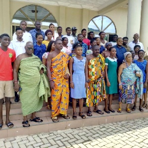 Some beneficiaries in a group photo with Committee members of the Asongli Education Fund