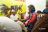 Alma Adade-Prempeh greeting a chief