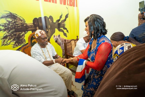 Alma Adade-Prempeh greeting a chief