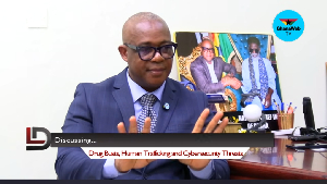 Photo of Dr Adam Bonaa speaking in an interview on GhanaWeb TV